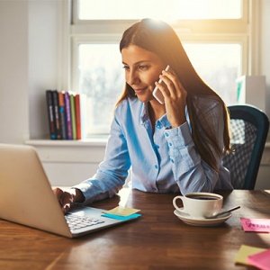 woman-on-phone-at-home-office